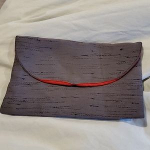 Handmade pouch, snap closure. Red and gray